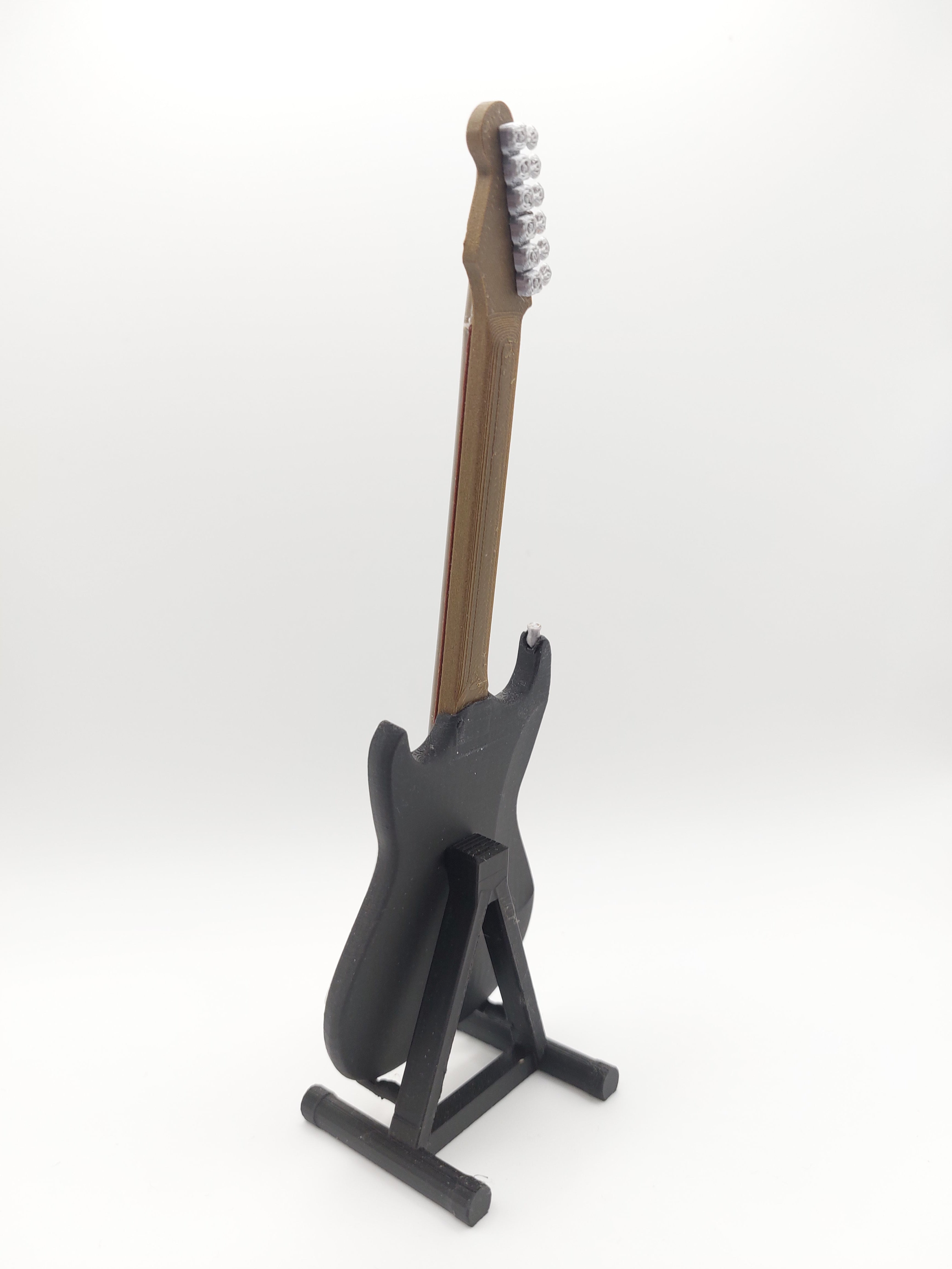 Miniatur E-Gitarre mit Gitarrenständer im Maßstab 1:6