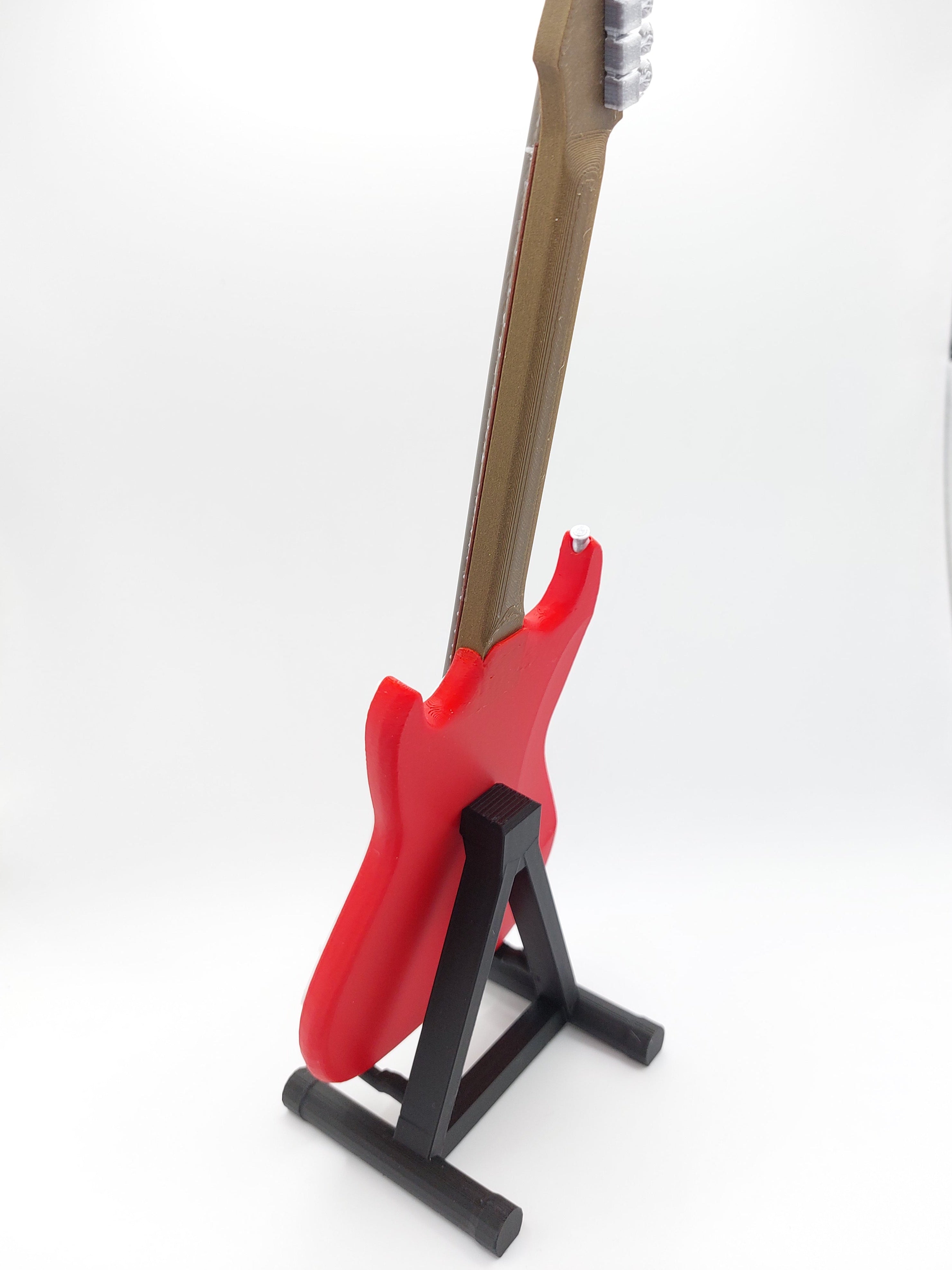Miniatur E-Gitarre mit Gitarrenständer im Maßstab 1:4