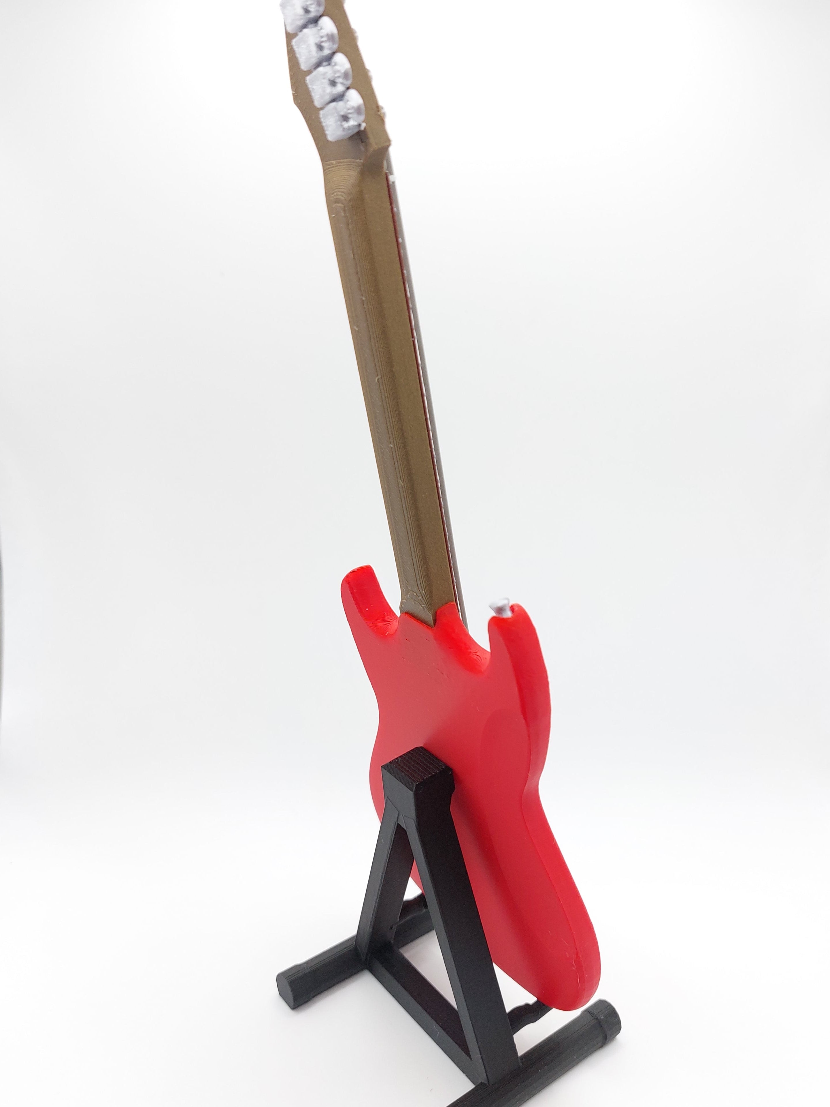 Miniatur E-Gitarre mit Gitarrenständer im Maßstab 1:4